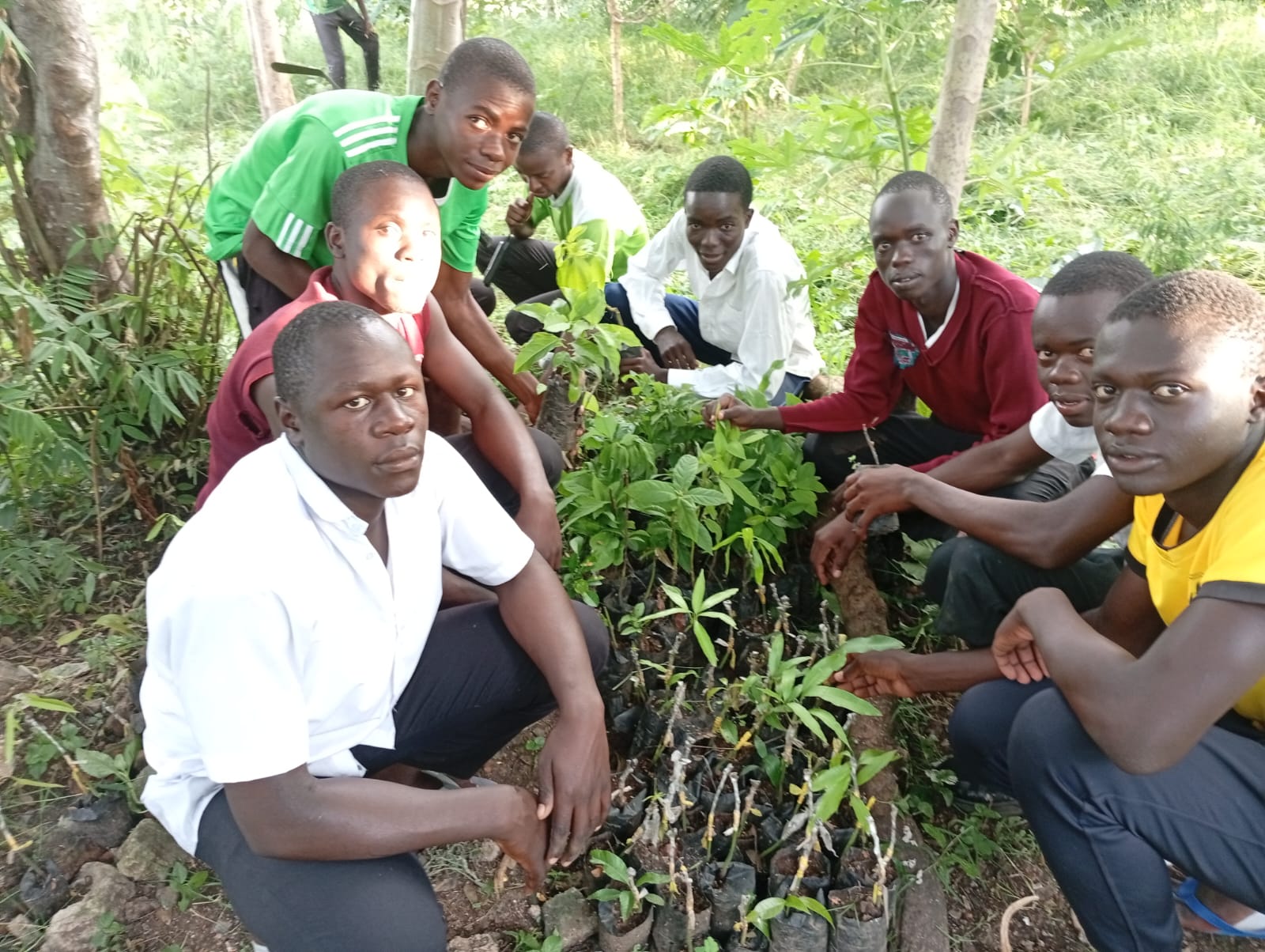 School children with tree saplings